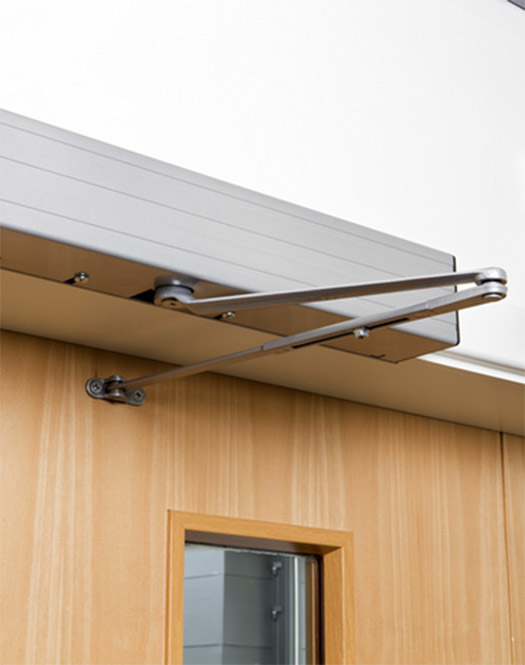 door opening mechanism above wooden door