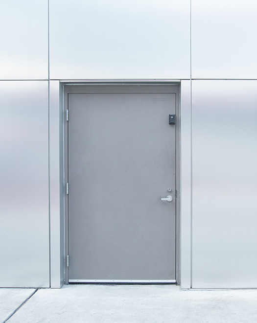 metal door in a modern wall with metal panels Commercial steel doors,Commercial steel door with frame, Commercial steel door frame,Commercial metal doors