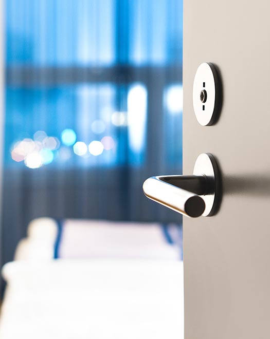 open door with a metal handle Commercial wood doors,Commercial interior wood doors, Commercial exterior wood doors, Commercial solid wood doors